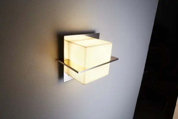 The Metrix LED sconce delivers efficient, high-quality illumination in a sleek polished nickel finish. Its compact 5.75-inch square profile and integrated LED technology make it ideal for modern bathrooms and hallways where space is at a premium.
