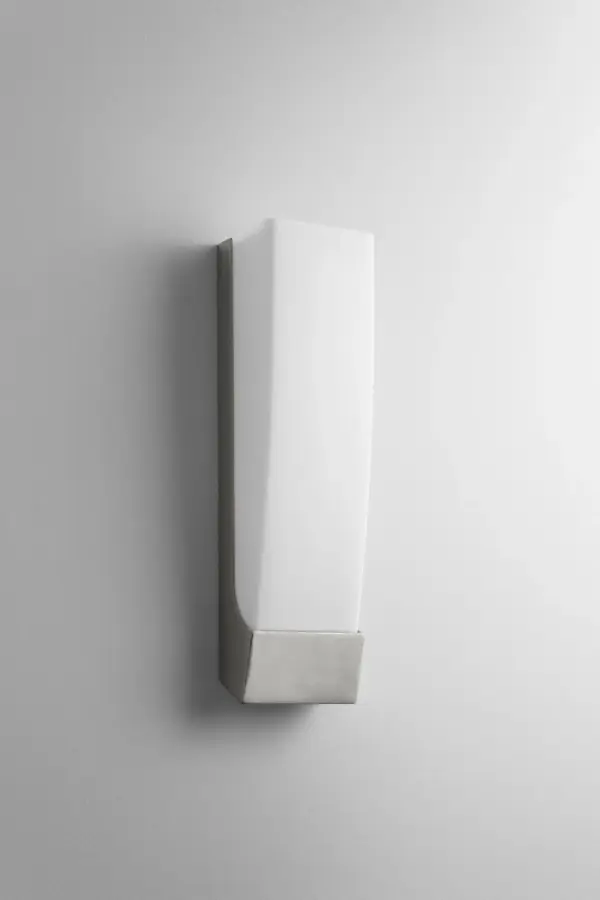 The Apollo LED Wall Sconce delivers modern illumination with integrated LED technology and a clean satin nickel finish. Its compact 4.5-inch width makes it ideal for tight spaces while providing bright, warm light output.