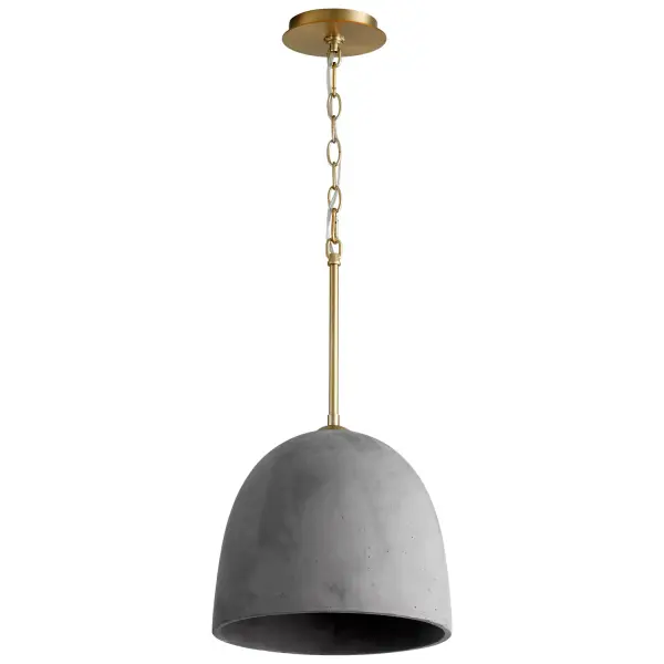 The Dune LED Pendant combines raw concrete texture with refined aged brass detailing for an industrial-modern aesthetic. Its compact 12-inch size makes it ideal for multiples over islands or as a statement piece in smaller spaces.