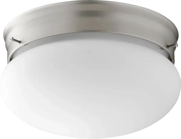A practical 7-inch flush mount ceiling light with clean satin nickel finish and white glass shade. Damp-rated for bathrooms and covered outdoor areas, offering reliable illumination in compact spaces.