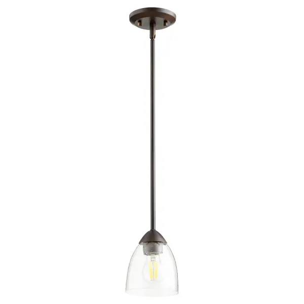 The Barkley mini pendant features clean-lined tube frames with organic forms that bridge traditional and contemporary styles. Its oiled bronze finish and clear seeded glass create visual interest while maintaining design versatility.