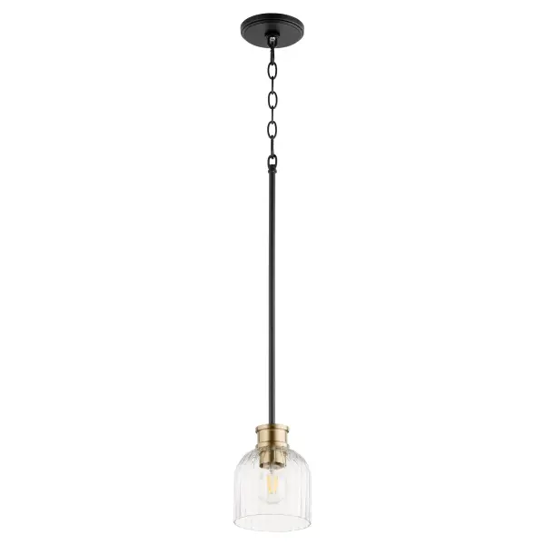 The Monarch pendant offers exceptional style versatility with its dual black and aged brass finish. Clear fluted glass shades and sharp-angled arms create visual interest while maintaining timeless appeal across multiple design aesthetics.