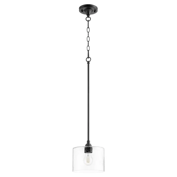 The Dakota mini pendant combines urban sophistication with practical versatility. Its geometric design features clear seeded glass and minimal black framework, perfect for modern and transitional spaces both indoors and covered outdoor areas.
