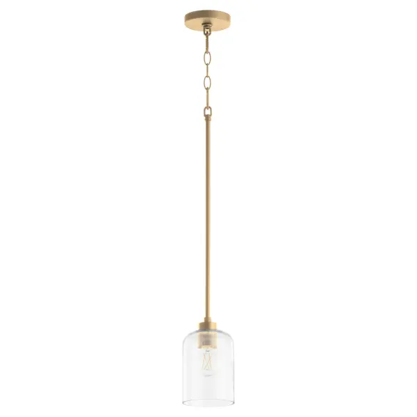 The Tribute pendant combines timeless design with modern versatility. Its aged brass finish and clear glass shade create a warm, inviting glow suitable for both indoor and outdoor spaces. Clean lines and subtle curves make it adaptable to various design schemes.