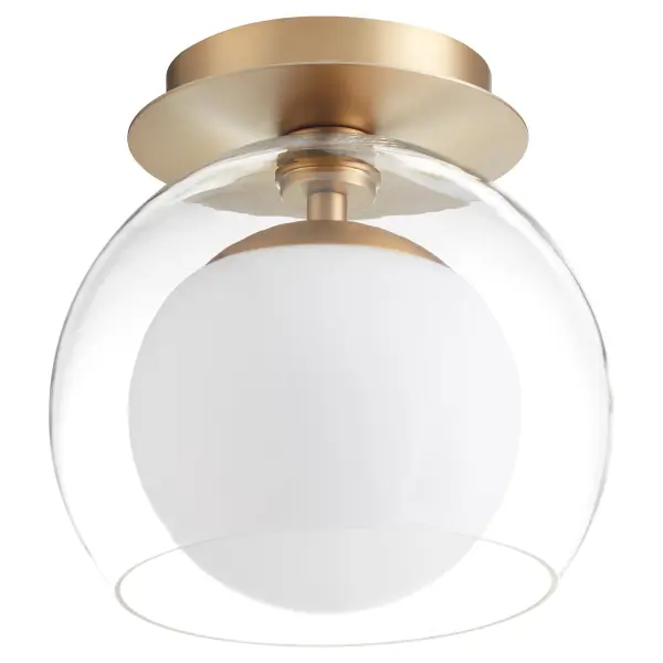 The Jasper ceiling mount combines aged brass warmth with soft opal glass diffusion in a compact 9" profile. Its transitional design bridges traditional and contemporary aesthetics, making it versatile for various spaces.