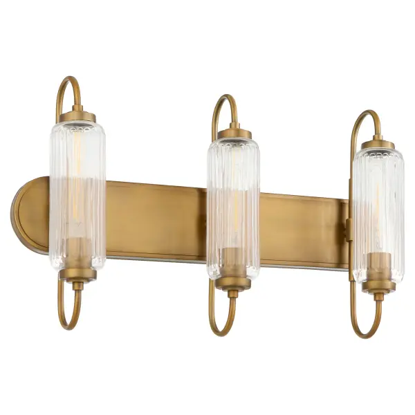 The Whitmire vanity light combines nostalgic radio-era design with contemporary brushed brass and ribbed glass. Its three-light configuration provides excellent illumination while the transitional style bridges traditional and modern aesthetics.