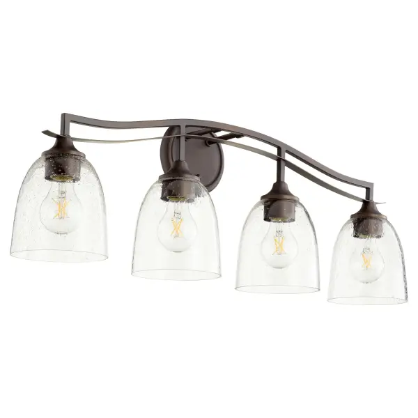 The Jardin vanity light combines intricate finials and soft curves with oiled bronze finish and clean opal glass shades. Its refined yet approachable design offers versatile elegance for any bathroom space.