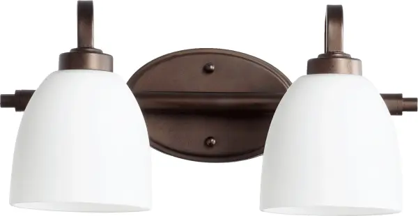 The Reyes 2-Light Vanity combines sleek transitional design with an elegant oiled bronze finish. Its clean lines and versatile aesthetic blend seamlessly with most bathroom styles while maintaining enough presence to stand out.