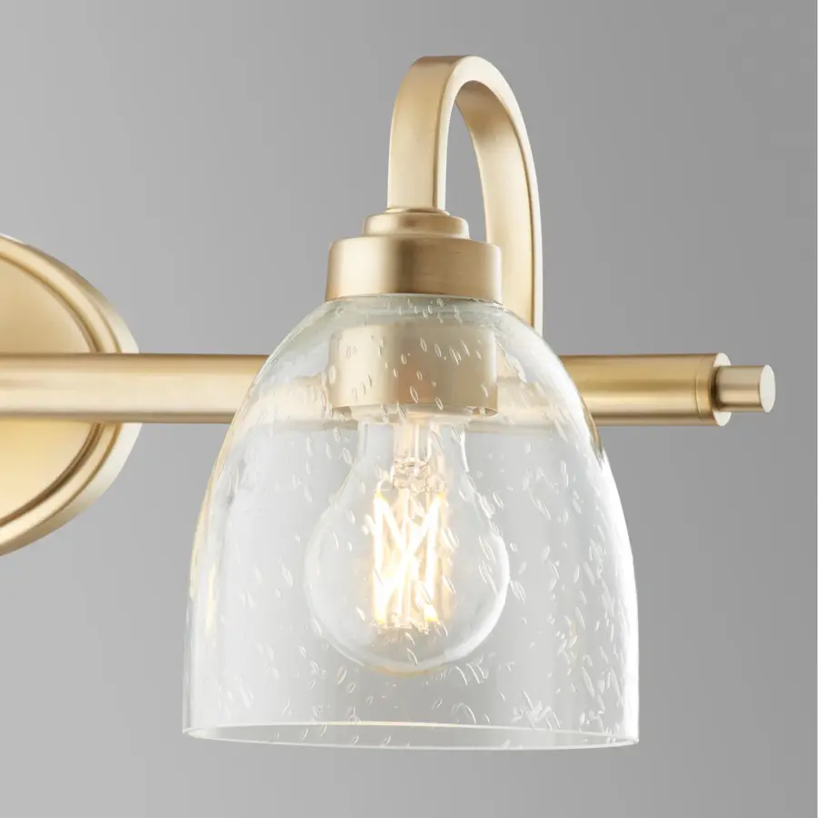 Reyes 3-Light Vanity in Aged Brass with Clear Seeded Glass - Image 3