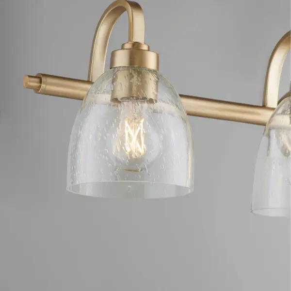 Reyes 4-Light Vanity in Aged Brass with Clear Seeded Glass - Image 4