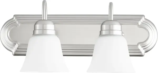 This two-light vanity fixture blends traditional design with contemporary appeal through its satin nickel finish and bell-shaped opal glass shades. Perfect for updating bathroom mirrors with clean, functional lighting.