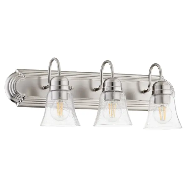 This traditional vanity light combines timeless design with contemporary appeal through its satin nickel finish and clear seeded glass shades. The three-light configuration provides excellent illumination for bathroom mirrors.