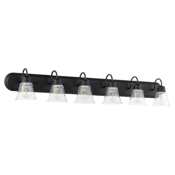 This traditional vanity light combines timeless design with contemporary noir finish. Six clear seeded glass bell shades provide ample illumination for larger bathroom mirrors while decorative knobs add refined detail.