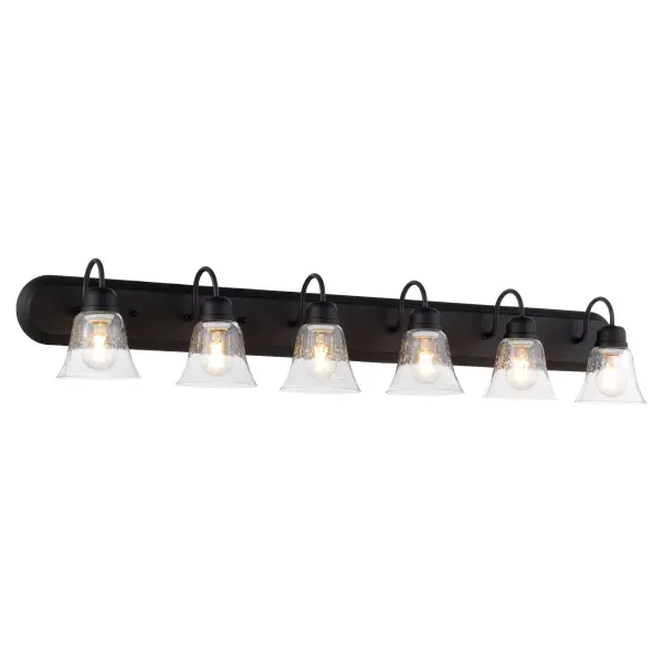 This traditional vanity light combines timeless design with contemporary noir finish. Six clear seeded glass bell shades provide ample illumination for larger bathroom mirrors while decorative knobs add refined detail. - alternate view