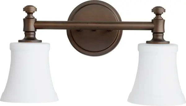 The Rossington vanity light offers clean lines and soft curves with a velvety Oiled Bronze finish. Its Satin Opal glass shades provide even, flattering illumination perfect for bathroom tasks while complementing both modern and traditional décor.