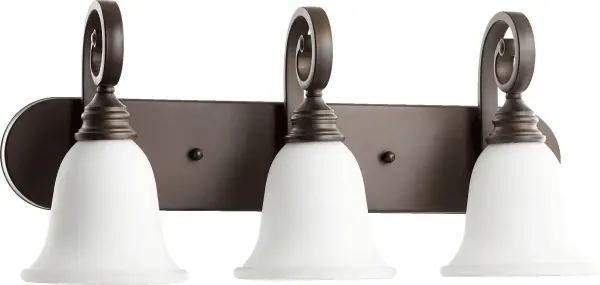 The Bryant vanity light brings sophisticated traditional design with its curvaceous symmetrical arms and luxurious oiled bronze finish. The satin opal glass shades provide soft, flattering illumination perfect for grooming tasks.