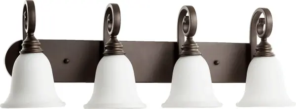 The Bryant vanity light combines classic design with modern functionality. Its curvaceous arms radiate in symmetrical balance, creating an elegant focal point. The oiled bronze finish paired with satin opal glass delivers soft, flattering illumination perfect for traditional and transitional bathrooms.