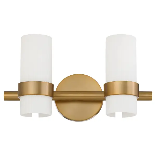 The Sojourn 2-Light Vanity combines contemporary design with nostalgic touches, featuring candle-like white milky glass pillars and brushed brass finish. Perfect for modern and transitional bathrooms seeking timeless elegance.