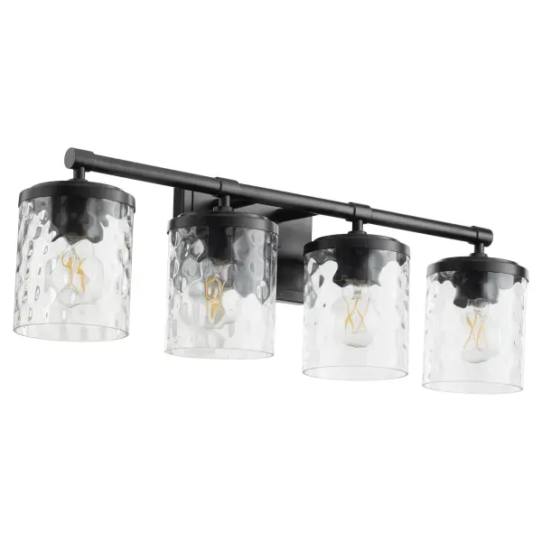 The Starky 4-Light Vanity combines traditional design with modern finishes. Clear hammered glass shades provide textured visual interest while the matte black frame adds contemporary edge to classic styling.