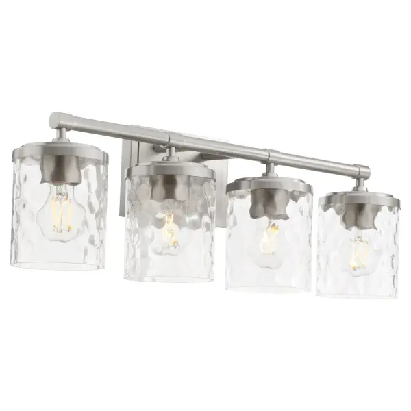 The Starky vanity light combines traditional elegance with practical illumination. Clear hammered glass shades on a satin nickel frame create visual interest while providing ample lighting for grooming tasks. - alternate view