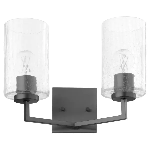 The Merrick 2-Light Vanity combines simple elegance with straightforward design, featuring right angles and a smooth matte black finish. Perfect for transitional spaces seeking understated sophistication.