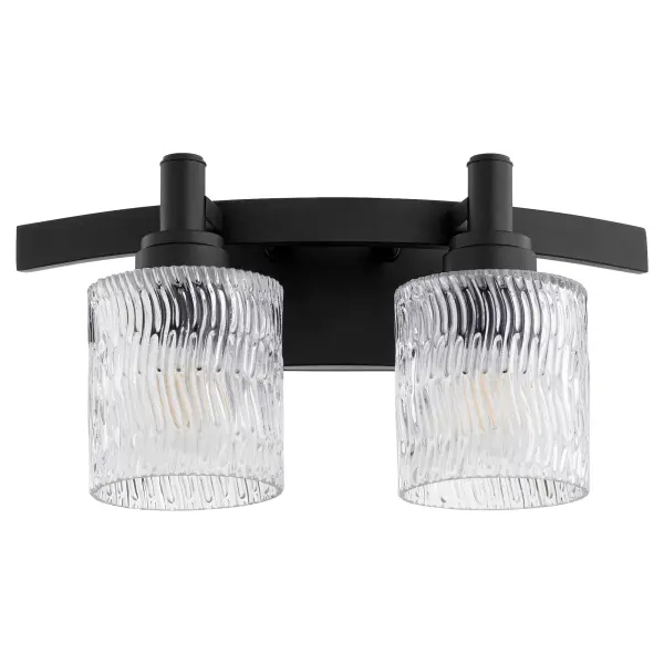 The Stadium vanity light delivers sophisticated style with its noir finish and clear chiseled glass shades. Versatile transitional design works across decor styles, while three socket finish options allow customization.