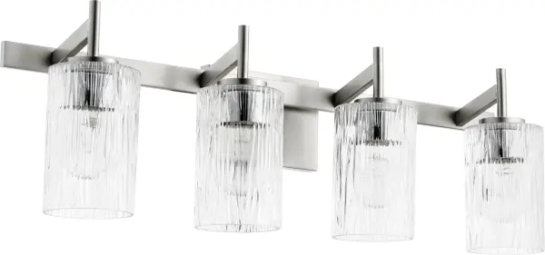 A modern 4-light vanity fixture featuring textured rectangular glass shades and a square backplate in satin nickel. Offers versatile styling with clean lines and contemporary appeal for bathroom spaces.