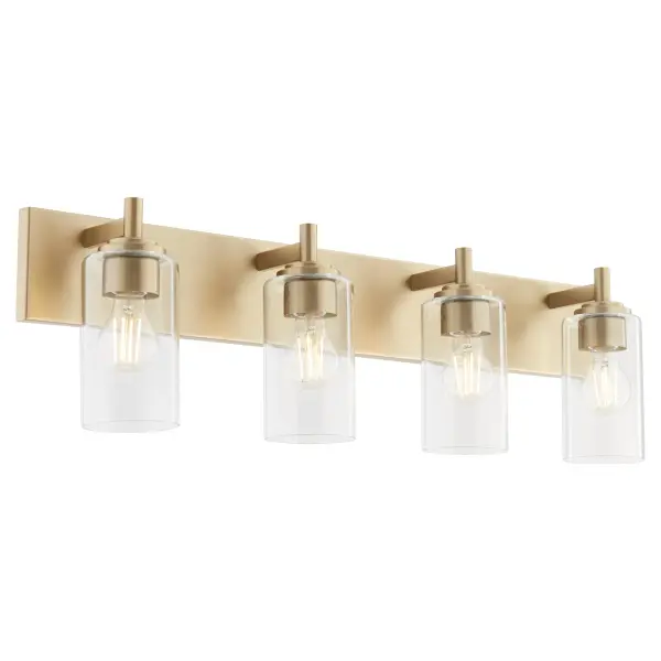 The Fallstaff 4-Light Vanity combines modern design with vintage-inspired aged brass finish. Features interchangeable socket decos in three finishes, clear glass shades, and T-shaped arms for customizable style and ample illumination. - alternate view
