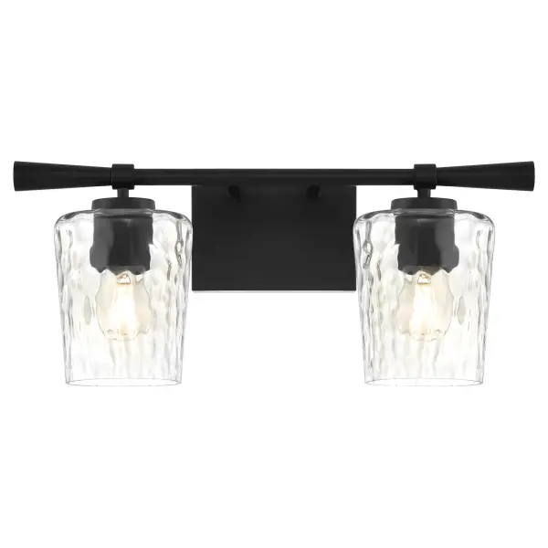 The Goodwin 2-Light Vanity combines industrial charm with transitional elegance through its clear hammered glass shades and sleek matte black frame. Perfect for bathrooms seeking a sophisticated yet approachable aesthetic. - alternate view
