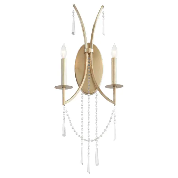The Malin wall sconce combines aged silver leaf frames with draped crystal beads for sophisticated lighting. Clear beads and classic crystals create stunning light refraction while soft curves balance angular details.