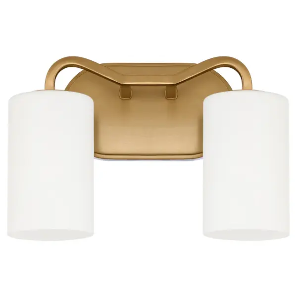 The Rutherford 2-Light Vanity brings understated sophistication to any bathroom with its clean lines and warm brushed brass finish. Featuring satin opal glass shades that provide soft, flattering illumination, this fixture blends historical charm with contemporary sensibility.