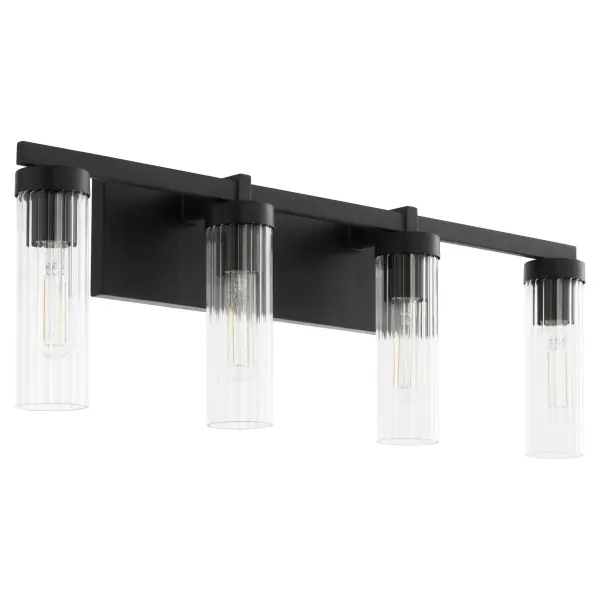The Kilbey 4-Light Vanity combines industrial aesthetics with refined details through its clear fluted glass shades and matte black finish. Perfect for modern bathrooms seeking a balance of style and function.