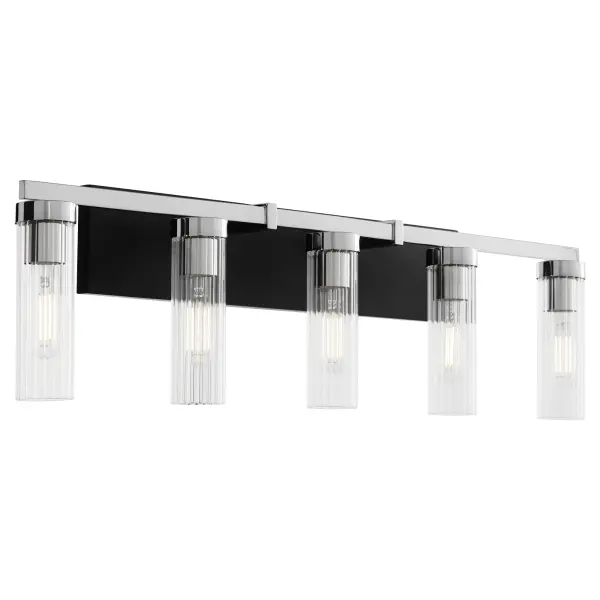 The Kilbey 5-Light Vanity combines industrial design with contemporary sophistication through its dual-tone matte black and chrome finish. Clear fluted glass shades add delicate texture while the minimal square rod design creates clean visual lines.