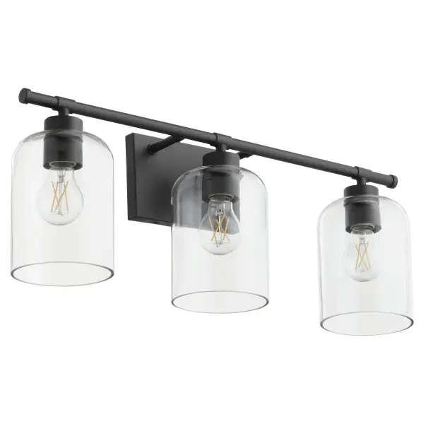 The Tribute 3-Light Vanity combines timeless design with contemporary matte black finish. Clear glass shades and smooth curves create an elegant, versatile fixture suitable for both indoor and outdoor applications.
