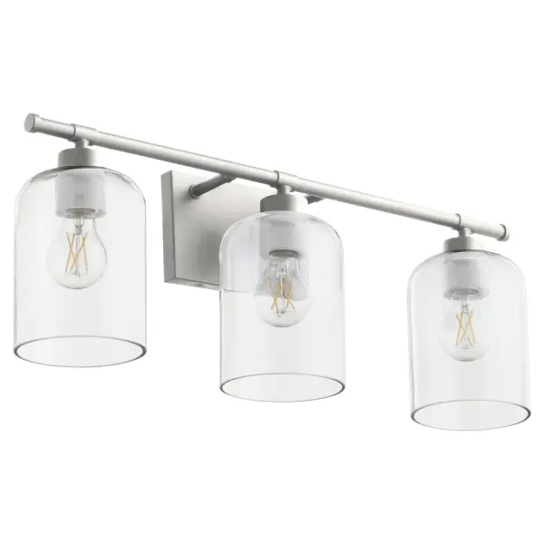 The Tribute 3-Light Vanity combines timeless design with modern functionality. Clear glass shades and smooth curves create an effortlessly elegant look, while its indoor-outdoor rating makes it exceptionally versatile.