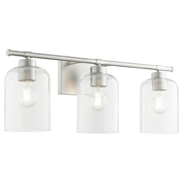 The Tribute 3-Light Vanity combines timeless design with modern functionality. Clear glass shades and smooth curves create an effortlessly elegant look, while its indoor-outdoor rating makes it exceptionally versatile. - alternate view