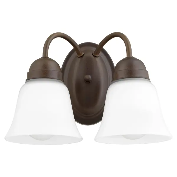 This 2-light wall sconce combines graceful round elements with classic detailing in a warm Oiled Bronze finish. Perfect for adding traditional charm to hallways, bedrooms, and bathrooms at an accessible price point.