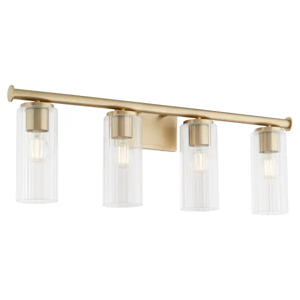 The Mercier 4-Light Vanity brings French chateau elegance to bathroom lighting with cylindrical disc details and slender clear glass shades. Its aged brass finish and clean silhouette create a luxurious, masculine aesthetic. - alternate view