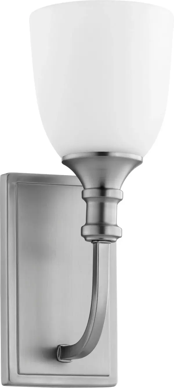 The Richmond wall sconce blends traditional elegance with playful design through its semicircular arms and curved glass shade. Its satin nickel finish and versatile styling make it suitable for various spaces.