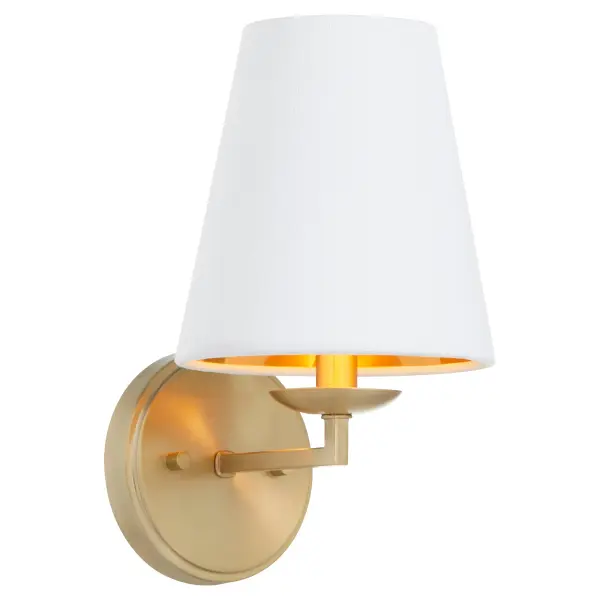 The Karnes wall sconce by Tamara Day brings classic sophistication with its aged brass finish and white linen shade featuring a gold interior lining. Perfect for adding warm ambient lighting to any space. - alternate view