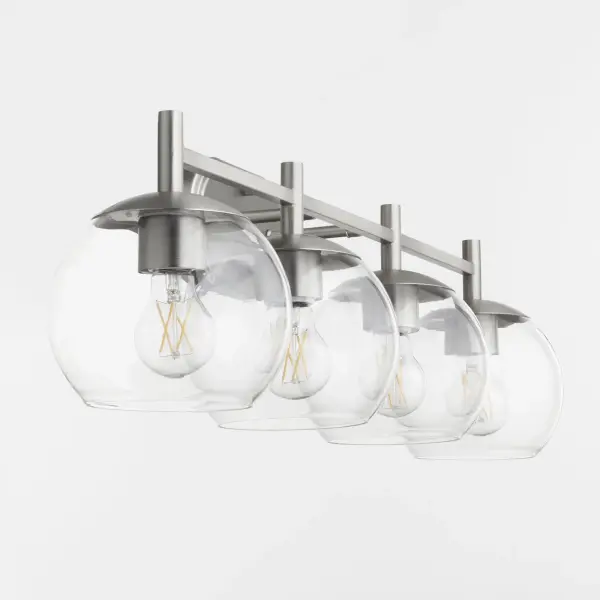 The Lyon 4-Light Vanity combines bold geometric lines with rounded clear glass shades for a sophisticated, uncomplicated look. Its satin nickel finish and transitional design make it versatile for modern and traditional bathrooms alike. - alternate view