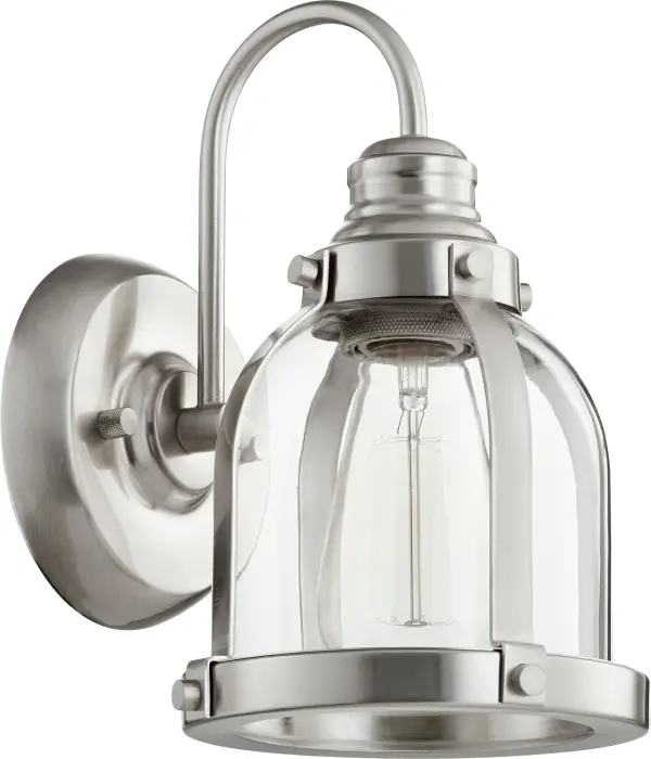The Denny wall sconce delivers understated sophistication with its clean lines and satin nickel finish. Perfect for creating cohesive lighting throughout your home, this fixture balances traditional charm with contemporary simplicity.
