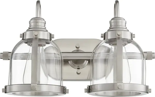 The Denny 2-Light Vanity combines clean lines with traditional sensibility in a versatile Satin Nickel finish. Perfect for bathrooms seeking a crisp, refined look that complements both classic and contemporary spaces.