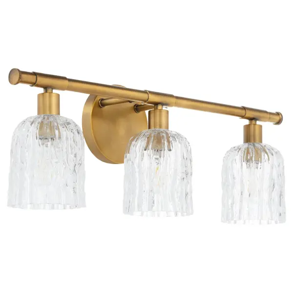 The Meriam vanity light brings Regency-era luxury to contemporary bathrooms with its brushed brass finish and unfiltered glass shades. Perfect for transitional and traditional spaces seeking balanced illumination with dramatic flair.
