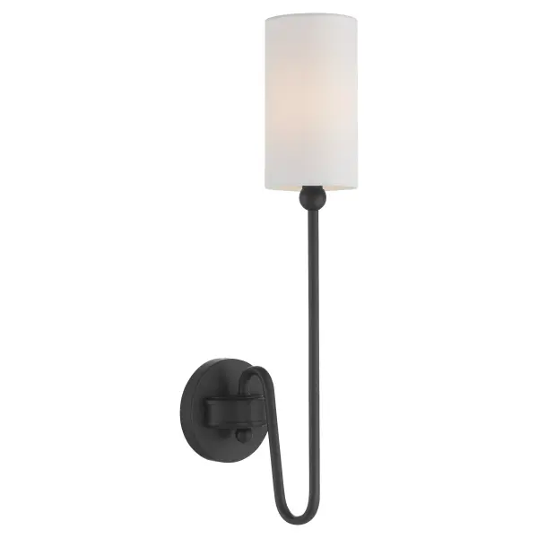 The Charlotte wall sconce blends classic silhouettes with contemporary curves, featuring a matte black finish and clear glass cylindrical shade. Designed by Tamara Day, it embodies 'laid back luxe' style perfect for modern homes. - alternate view