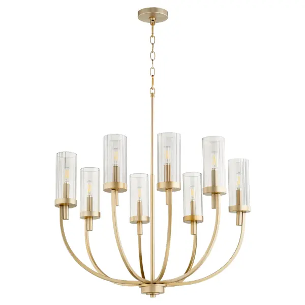 The Ladin chandelier combines bold lines with rounded profiles to create a serene, contemporary aesthetic. Its aged brass finish and less-is-more design philosophy make it versatile for modern and transitional spaces.