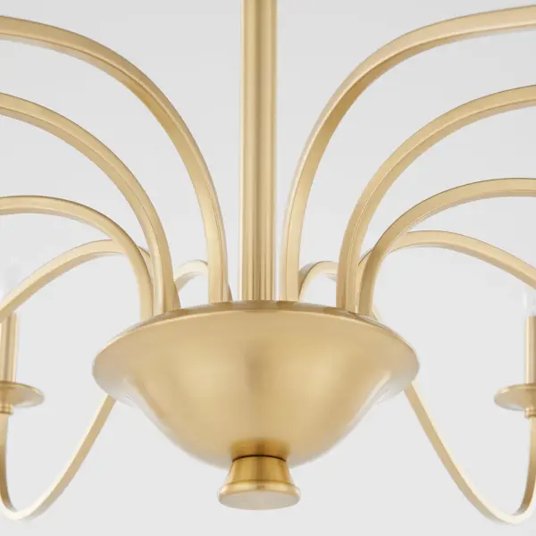 The Maryse 10-Light Chandelier brings classic sophistication with its aged brass finish and elongated curves. Perfect for formal dining rooms and grand entryways, this substantial fixture combines traditional design with clean details. - alternate view