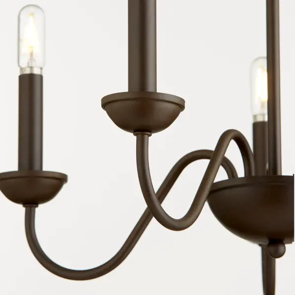 This 5-light chandelier combines classic traditional design with a rich oiled bronze finish. Its graceful curves and versatile styling make it perfect for dining rooms, foyers, and living spaces seeking timeless charm. - alternate view