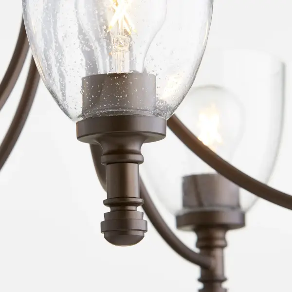 The Rossington 5-Light Chandelier bridges traditional and contemporary design with clean lines, soft curves, and a velvety Oiled Bronze finish. Satin Opal glass shades provide warm, diffused lighting perfect for dining and living spaces. - alternate view