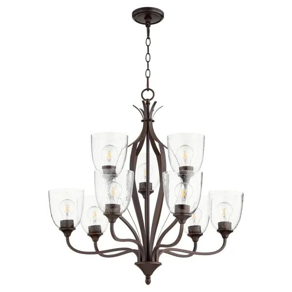 The Jardin 9-Light Chandelier combines intricate finials and soft curves with oiled bronze finish and clean opal glass shades. Its refined yet approachable design brings understated elegance to any space.